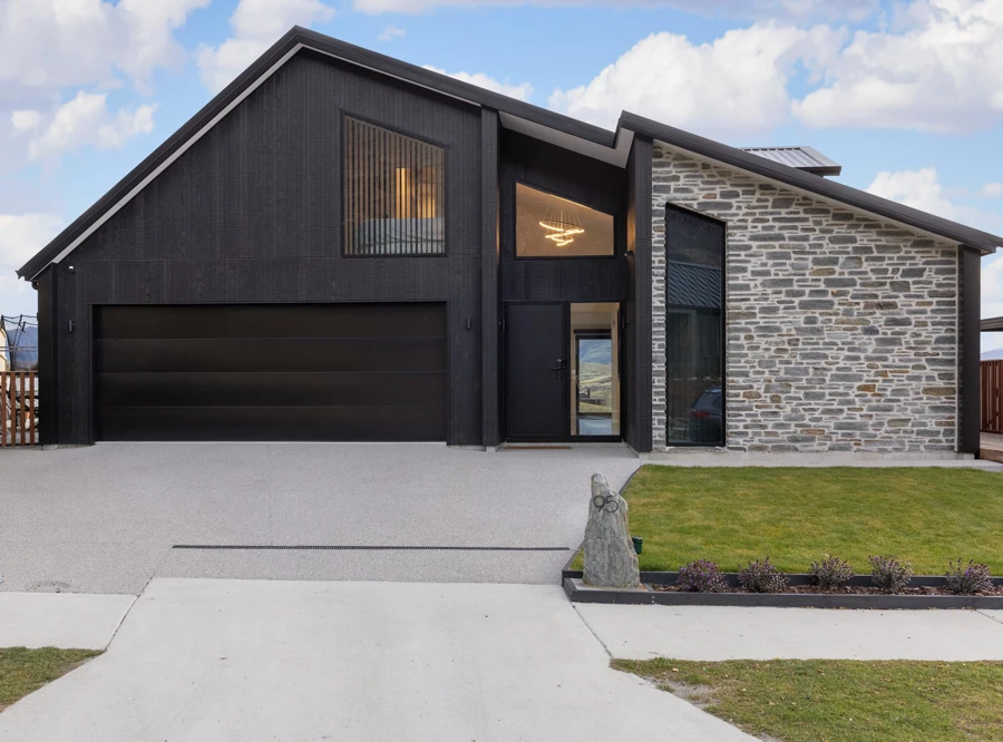 Modern Home with Dark, Striking Architectural Facade | Classic Builders