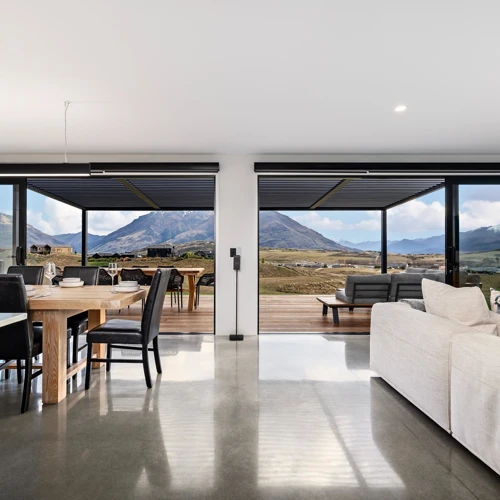 Open-plan house interior with an overlooking scenic landscape | Classic Builders